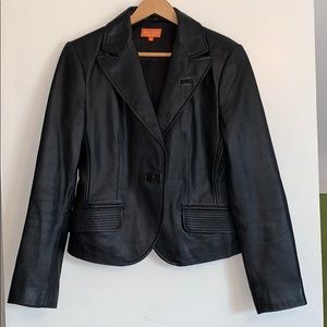 Leather blazer-style jacket in black.